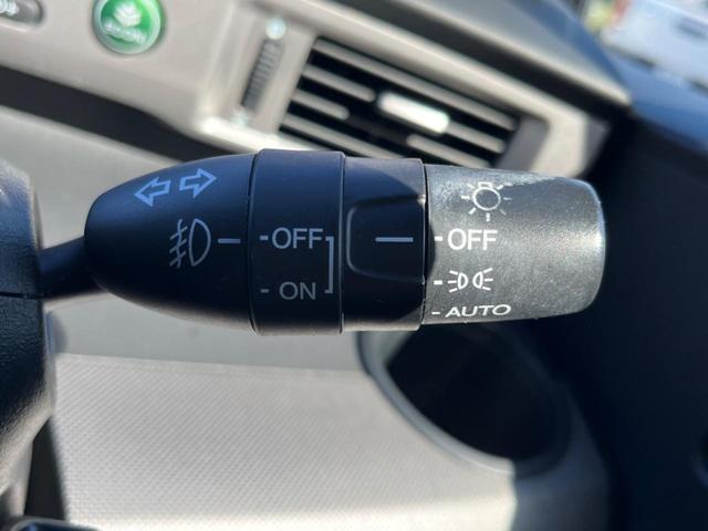 フリードハイブリッド ジャストセレクション フリップダウンモニター 助手席側パワースライドドア 純正ナビ バックカメラ ドライブレコーダー ETC スマートキー オートライト オートエアコン クルーズコントロール HIDヘッドライト(44枚目)