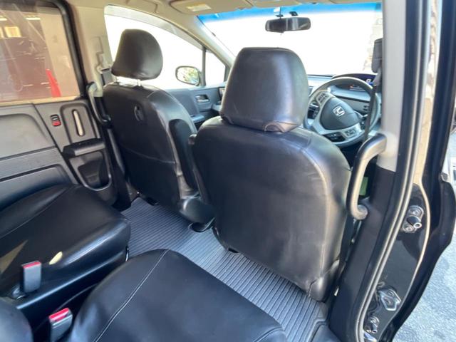 フリードハイブリッド ジャストセレクション フリップダウンモニター 助手席側パワースライドドア 純正ナビ バックカメラ ドライブレコーダー ETC スマートキー オートライト オートエアコン クルーズコントロール HIDヘッドライト(55枚目)