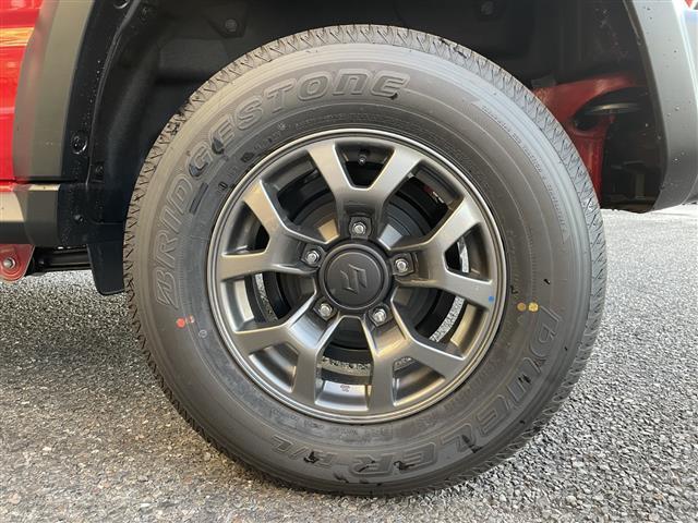 ジムニーノマド ＦＣ　４ＷＤ　シートヒーター（前席）　アイドリングストップ　レーンキープアシスト　衝突被害軽減ブレーキ　コーナーセンサー　純正アルミホイール　レーダークルーズコントロール　ヒルディセントコントロール（38枚目）