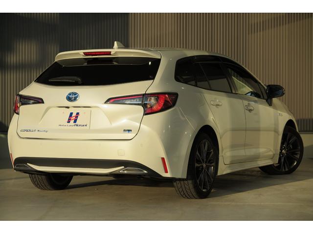 カローラツーリング ハイブリッド　ダブルバイビー　前席シートヒーター　ステアリングヒーター　ヒーテッドドアミラー　ドラレコ　ＦＲソナー　ＨＵＤ　ＥＶモード　ブラインドスポットモニター　ブレーキホールド　プッシュスタート　ワイヤレス充電　レーンキープ（64枚目）