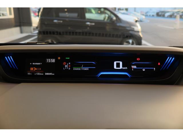 フリードハイブリッド ハイブリッド・Ｇホンダセンシング　木目調パネル　ヒーテッドドアミラー　ステアリモコン　ＬＥＤオートライト　プッシュスタート　ＴＶジャンパー　ホンダセンシング　レーンキープ　ＬＫＡＳ　アダプティブクルーズコントロール　ＥＣＯＮ（5枚目）