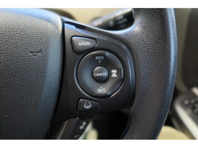 フリードハイブリッド ハイブリッド・Ｇホンダセンシング　木目調パネル　ヒーテッドドアミラー　ステアリモコン　ＬＥＤオートライト　プッシュスタート　ＴＶジャンパー　ホンダセンシング　レーンキープ　ＬＫＡＳ　アダプティブクルーズコントロール　ＥＣＯＮ（9枚目）