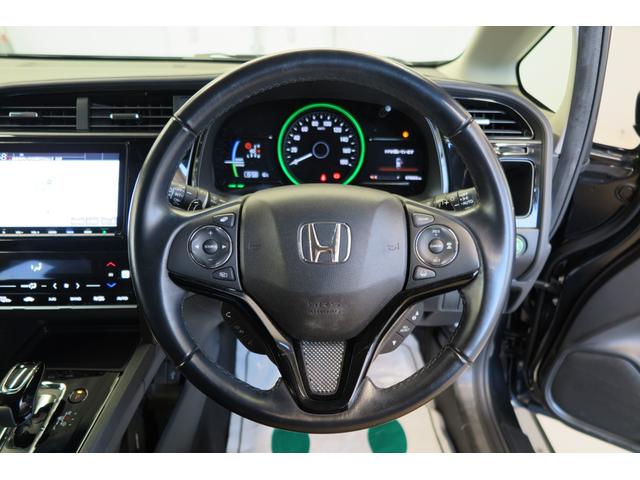 シャトル ハイブリッドZ ホンダセンシング ドラレコ前後 レーンキープ シートヒーター アダプティブクルーズコントロール ECON ヒーテッドドアミラー パドルシフト TVジャンパー 衝突被害軽減ブレーキ バックカメラ ETC イモビライザー(5枚目)