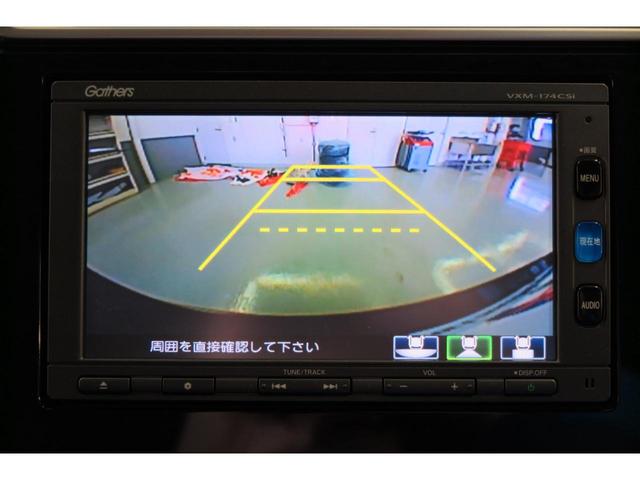 フィットハイブリッド Ｆパッケージ　ステアリングリモコン　スポーツモード　プッシュスタート　ＥＣＯＮ　純正ナビ　エンジンスターター　オートエアコン　バックカメラ（5枚目）