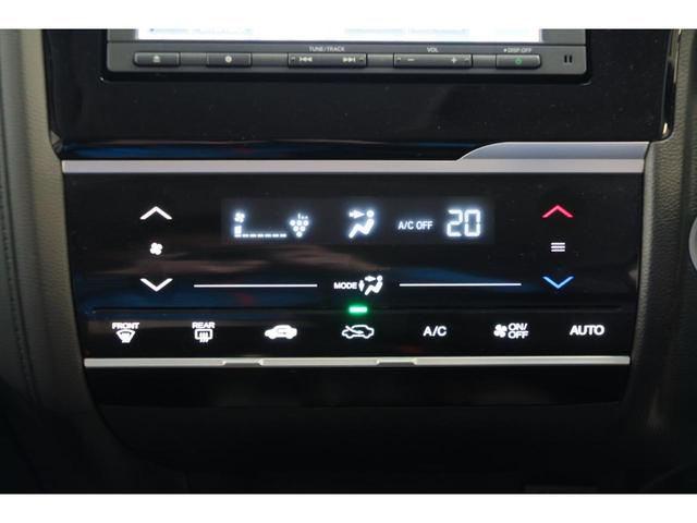 フィットハイブリッド Ｆパッケージ　ステアリングリモコン　スポーツモード　プッシュスタート　ＥＣＯＮ　純正ナビ　エンジンスターター　オートエアコン　バックカメラ（23枚目）