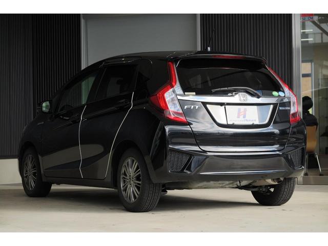 フィットハイブリッド Ｆパッケージ　ステアリングリモコン　スポーツモード　プッシュスタート　ＥＣＯＮ　純正ナビ　エンジンスターター　オートエアコン　バックカメラ（54枚目）