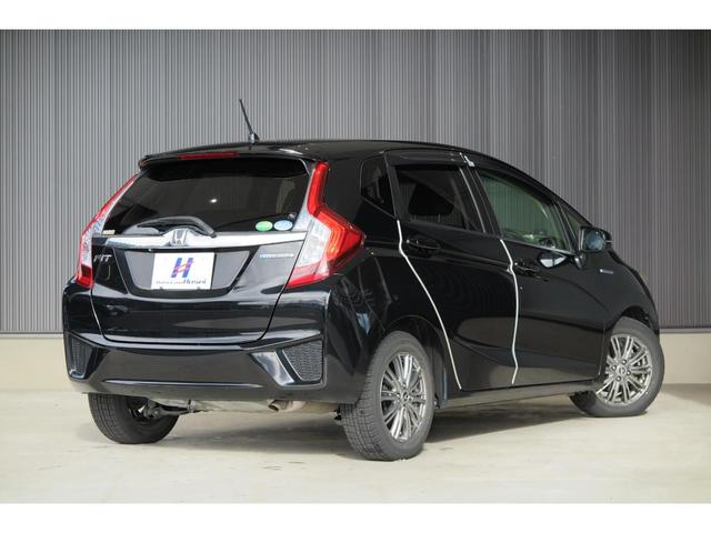 フィットハイブリッド Ｆパッケージ　ステアリングリモコン　スポーツモード　プッシュスタート　ＥＣＯＮ　純正ナビ　エンジンスターター　オートエアコン　バックカメラ（64枚目）