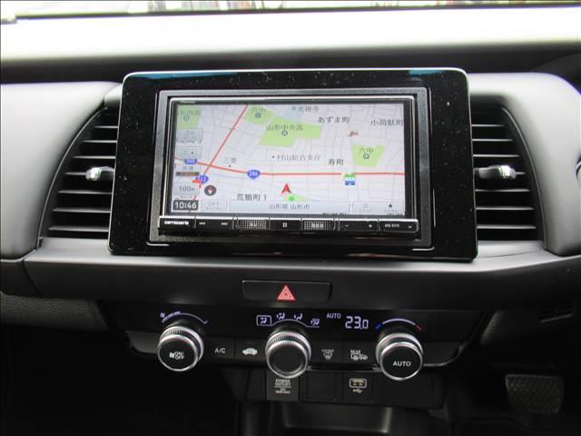 フィット ｅ：ＨＥＶホーム　４ＷＤ　メモリーナビ　Ｂｌｕｅｔｏｏｔｈ　バックモニター　ＥＴＣ　ドライブレコーダー　寒冷地仕様　ホンダセンシング　アダプティブクルーズコントロール　ＬＥＤヘッド　オートハイビーム　革巻ステアリング（51枚目）