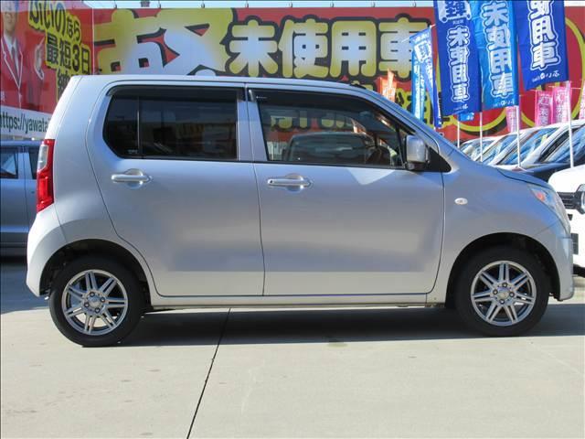 ワゴンＲ ＦＸ　４ＷＤ　禁煙車　純正ＣＤオーディオ　シートヒーター　電動格納ヒーテッドドアミラー　ヘッドライトレベライザー　エネチャージ　アイドリングストップ　バニティーミラー　オートエアコン　社外１４インチアルミ（26枚目）