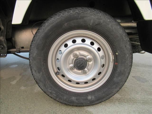 キャリイトラック KCエアコン・パワステ 4WD 禁煙車 マニュアルエアコン MT 3方開荷台 ラジオ パワーステアリング ハロゲンヘッドランプ ドリンクホルダー シガーソケット 運転席エアバック 助手席エアバック(40枚目)