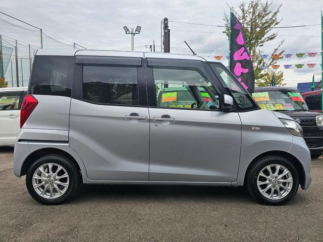 ｅＫスペース Ｅ　車検９年１０月・新品国産夏タイヤ社外アルミホイール両側スライドドア純正ＣＤキーレスＥＴＣアイドリングＳＴＯＰプライバシーガラス運転席・助手席エアバック電動格納ミラーＡＢＳタイベルチェーン取説・記録簿（6枚目）