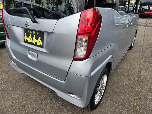 ｅＫスペース Ｅ　車検９年１０月・新品国産夏タイヤ社外アルミホイール両側スライドドア純正ＣＤキーレスＥＴＣアイドリングＳＴＯＰプライバシーガラス運転席・助手席エアバック電動格納ミラーＡＢＳタイベルチェーン取説・記録簿（48枚目）