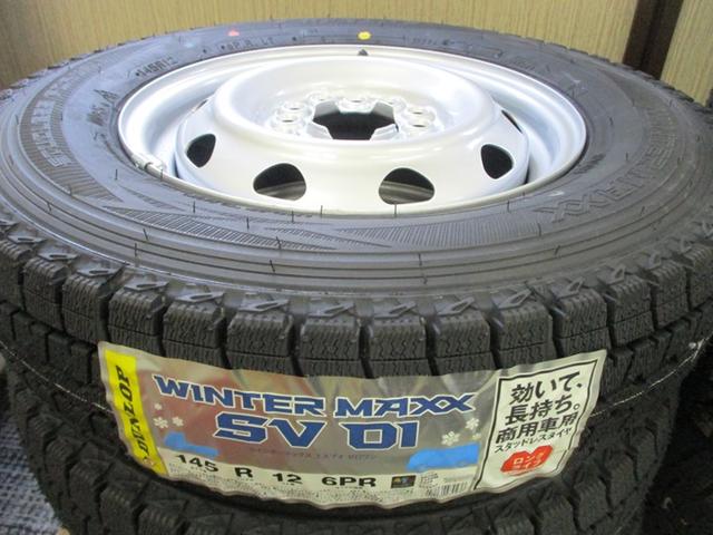 ハイゼットカーゴ ＤＸ　切り替え式４ＷＤ車検９年１０月・新品国産スタッドレスタイヤ新品ホイール新品国産夏タイヤ純正ラジオＥＴＣアイドリングＳＴＯＰキーレス両側スライドドア前席パワーウインドウＡＢＳタイベルチェーン取説・記録簿（4枚目）