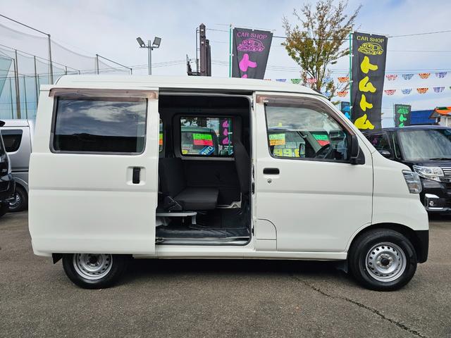 ハイゼットカーゴ ＤＸ　切り替え式４ＷＤ車検９年１０月・新品国産スタッドレスタイヤ新品ホイール新品国産夏タイヤ純正ラジオＥＴＣアイドリングＳＴＯＰキーレス両側スライドドア前席パワーウインドウＡＢＳタイベルチェーン取説・記録簿（7枚目）