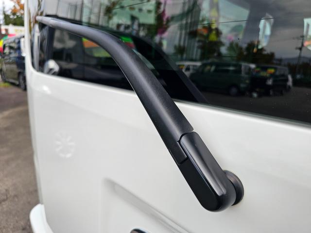 ハイゼットカーゴ ＤＸ　切り替え式４ＷＤ車検９年１０月・新品国産スタッドレスタイヤ新品ホイール新品国産夏タイヤ純正ラジオＥＴＣアイドリングＳＴＯＰキーレス両側スライドドア前席パワーウインドウＡＢＳタイベルチェーン取説・記録簿（15枚目）