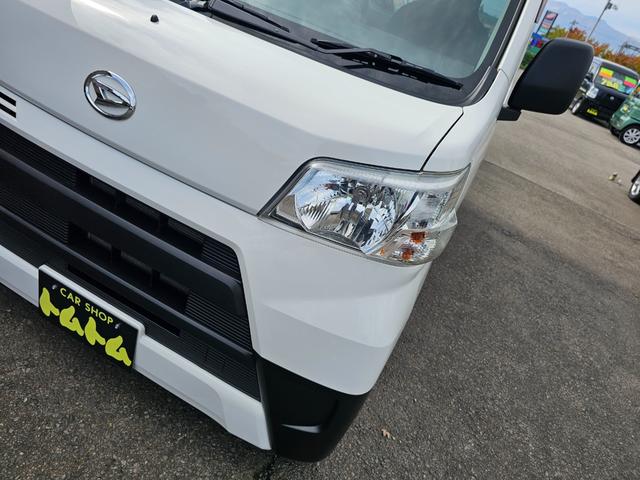 ハイゼットカーゴ ＤＸ　切り替え式４ＷＤ車検９年１０月・新品国産スタッドレスタイヤ新品ホイール新品国産夏タイヤ純正ラジオＥＴＣアイドリングＳＴＯＰキーレス両側スライドドア前席パワーウインドウＡＢＳタイベルチェーン取説・記録簿（47枚目）