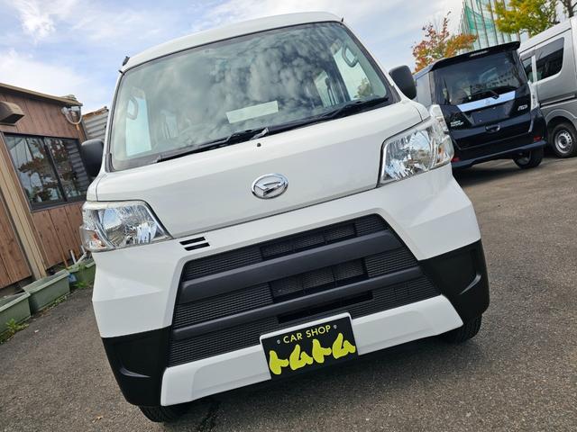 ハイゼットカーゴ ＤＸ　切り替え式４ＷＤ車検９年１０月・新品国産スタッドレスタイヤ新品ホイール新品国産夏タイヤ純正ラジオＥＴＣアイドリングＳＴＯＰキーレス両側スライドドア前席パワーウインドウＡＢＳタイベルチェーン取説・記録簿（63枚目）
