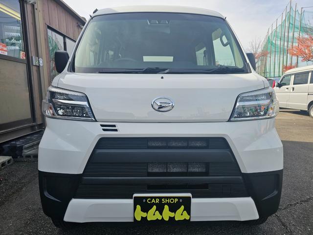 ハイゼットカーゴ ＤＸ　ＳＡＩＩＩ　切り替え式４ＷＤ車検８年１０月・新品国産スタッドレスタイヤ新品ホイール社外ナビブルートゥース社外バックカメラ新品国産夏タイヤ純正ＬＥＤヘッドライト衝突軽減ブレーキ横滑防止キーレスＡＢＳタイベルチェーン（2枚目）