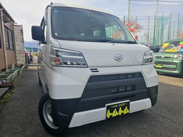 ハイゼットカーゴ ＤＸ　ＳＡＩＩＩ　切り替え式４ＷＤ車検８年１０月・新品国産スタッドレスタイヤ新品ホイール社外ナビブルートゥース社外バックカメラ新品国産夏タイヤ純正ＬＥＤヘッドライト衝突軽減ブレーキ横滑防止キーレスＡＢＳタイベルチェーン（3枚目）