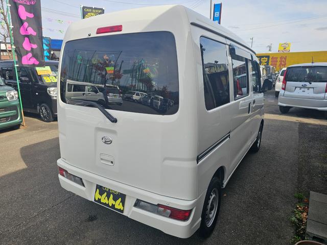 ハイゼットカーゴ ＤＸ　ＳＡＩＩＩ　切り替え式４ＷＤ車検８年１０月・新品国産スタッドレスタイヤ新品ホイール社外ナビブルートゥース社外バックカメラ新品国産夏タイヤ純正ＬＥＤヘッドライト衝突軽減ブレーキ横滑防止キーレスＡＢＳタイベルチェーン（10枚目）