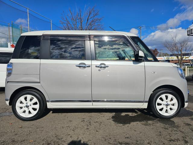 ムーヴキャンバス Ｇブラックインテリアリミテッド　ＳＡＩＩＩ　車検９年１１月・新品国産スタッドレスタイヤ新品アルミ純正ナビフルセグＴＶブルートゥース全方位カメラ新品国産夏タイヤ社外ホワイトアルミ両側電動スライドドア衝突軽減ブレーキ横滑防止スマートキー取説・記録簿（6枚目）