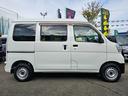 ハイゼットカーゴ ＤＸ　切り替え式４ＷＤ車検９年１０月・新品国産スタッドレスタイヤ新品ホイール新品国産夏タイヤ純正ラジオＥＴＣアイドリングＳＴＯＰキーレス両側スライドドア前席パワーウインドウＡＢＳタイベルチェーン取説・記録簿（6枚目）