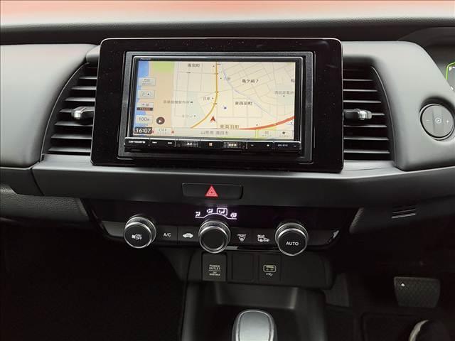 フィット ｅ：ＨＥＶホーム　禁煙車　４ＷＤナビゲーション　バックカメラ　ホンダセンシング　アダプティブクルーズコントロール　ドライブレコーダー　ＬＥＤライト　ＥＴＣ　オートエアコン　シートリフター　スマートキー　バニティーミラー（58枚目）