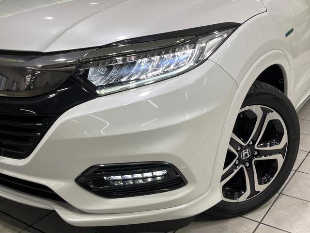 ヴェゼル ハイブリッドＺ・ホンダセンシング　４ＷＤ　禁煙車　純正ナビ　バックカメラ　衝突軽減　レーダークルコン　ＥＴＣ　ドラレコ　シートヒーター　ハーフレザーシート　ＬＥＤヘッドライト　パドルシフト　オートライト　ステアリングスイッチ（13枚目）