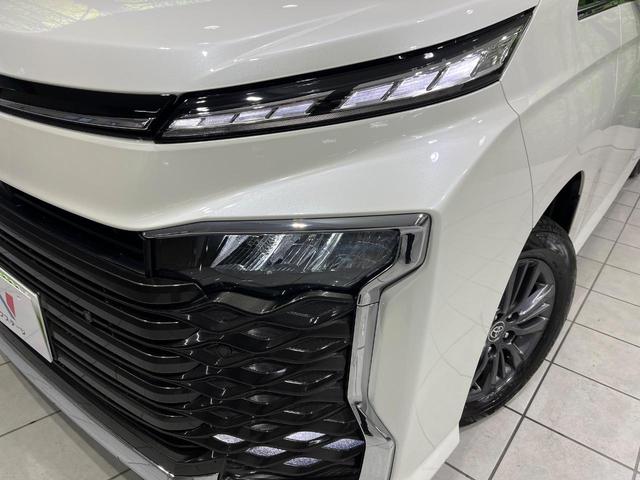 ヴォクシー ハイブリッドＳ－Ｚ　４ＷＤ　禁煙車　衝突軽減　両側電動ドア　純正１０インチディスプレイオーディオ　バックカメラ　レーダークルーズコントロール　前席シートヒーター　ＬＥＤヘッドライト　ＥＴＣ　リアオートエアコン（14枚目）