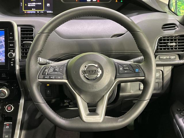 セレナ ハイウェイスター 4WD 禁煙車 寒冷地仕様 フリップダウンモニター プロパイロット 衝突軽減 純正9インチナビ 全周囲カメラ ドラレコ ETC 駐車支援システム スマートキー クリアランスソナー アイドリングストップ(14枚目)