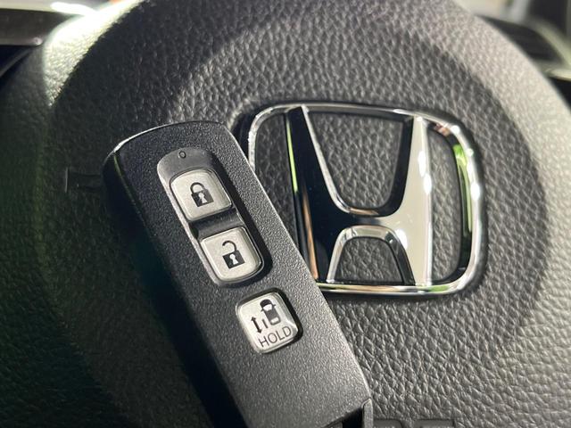 N-BOXカスタム G・Lホンダセンシング 禁煙車 衝突軽減 アダプティブクルーズコントロール 純正ナビ バックカメラ ETC 両側スライド片側電動ドア クリアランスソナー  シートヒーター スマートキー 車線逸脱防止装置 横滑り防止装置(39枚目)