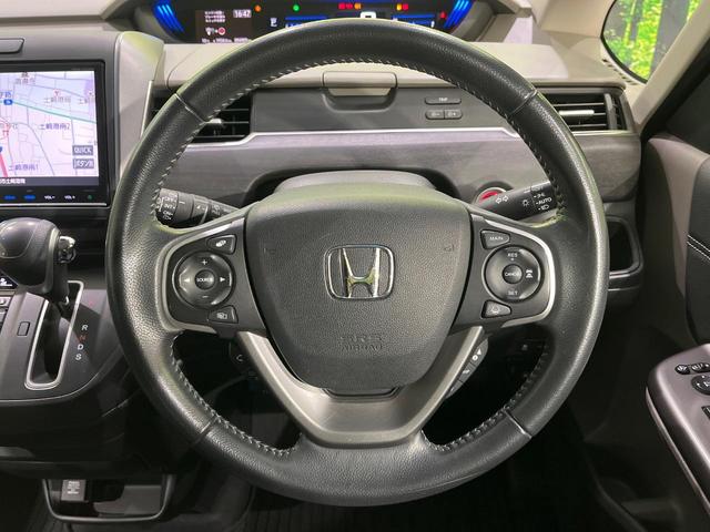 フリード G・ホンダセンシング 4WD 衝突軽減 禁煙車 両側電動ドア 純正9インチナビ バックカメラ アダプティブクルーズコントロール 前席シートヒーター ETC bluetooth  純正15インチアルミホイール 車線逸脱警報(13枚目)