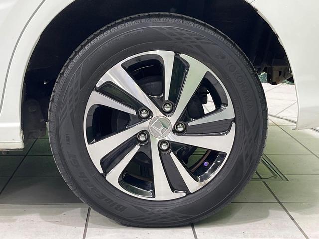 フリード G・ホンダセンシング 4WD 衝突軽減 禁煙車 両側電動ドア 純正9インチナビ バックカメラ アダプティブクルーズコントロール 前席シートヒーター ETC bluetooth  純正15インチアルミホイール 車線逸脱警報(65枚目)