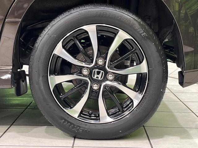 N-BOXカスタム G・Lホンダセンシング 4WD 禁煙車 衝突軽減 純正8型ナビ 電動ドア レーダークルーズ バックカメラ Bluetooth ETC クリアランスソナー 前席シートヒーター LEDヘッドライト LEDフォグ オートエアコン(24枚目)