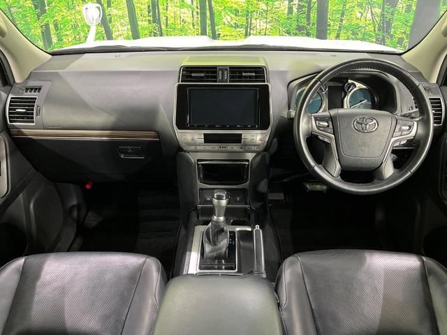 ランドクルーザープラド ＴＸ　Ｌパッケージ　４ＷＤ　禁煙車　衝突軽減　純正９型ナビ　バックカメラ　レーダークルーズ　シートベンチレーション　ＥＴＣ　ドラレコ　７人乗り　黒革シート　前席パワーシート　クリアランスソナー　ＬＥＤヘッド（2枚目）