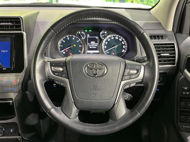 ランドクルーザープラド ＴＸ　Ｌパッケージ　４ＷＤ　禁煙車　衝突軽減　純正９型ナビ　バックカメラ　レーダークルーズ　シートベンチレーション　ＥＴＣ　ドラレコ　７人乗り　黒革シート　前席パワーシート　クリアランスソナー　ＬＥＤヘッド（13枚目）