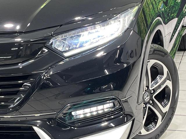 ヴェゼル ハイブリッドＺ・ホンダセンシング　４ＷＤ　禁煙車　衝突軽減　無限フルエアロ　純正ナビ　レーダークルーズ　バックカメラ　ＥＴＣ　前席シートヒーター　寒冷地仕様　前席パワーシート　オートライト　オートエアコン　オートハイビーム（13枚目）