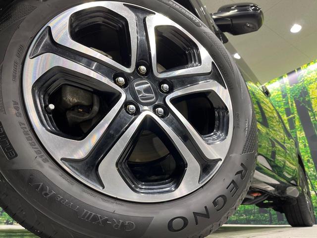 ヴェゼル ハイブリッドＺ・ホンダセンシング　４ＷＤ　禁煙車　衝突軽減　無限フルエアロ　純正ナビ　レーダークルーズ　バックカメラ　ＥＴＣ　前席シートヒーター　寒冷地仕様　前席パワーシート　オートライト　オートエアコン　オートハイビーム（14枚目）