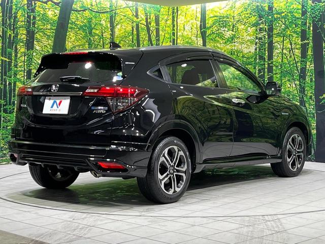 ヴェゼル ハイブリッドＺ・ホンダセンシング　４ＷＤ　禁煙車　衝突軽減　無限フルエアロ　純正ナビ　レーダークルーズ　バックカメラ　ＥＴＣ　前席シートヒーター　寒冷地仕様　前席パワーシート　オートライト　オートエアコン　オートハイビーム（18枚目）