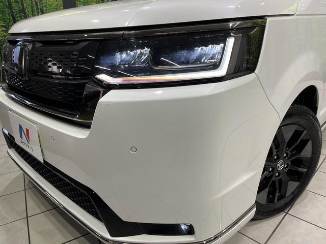 ステップワゴン スパーダ　４ＷＤ　禁煙車　衝突軽減　ナビ　バックカメラ　両側電動ドア　ブラインドスポットモニター　ＥＴＣ　シートヒーター　パワーバックドア　レーダークルーズコントロール　ドラレコ　Ｂｌｕｅｔｏｏｔｈ　フルセグ（14枚目）