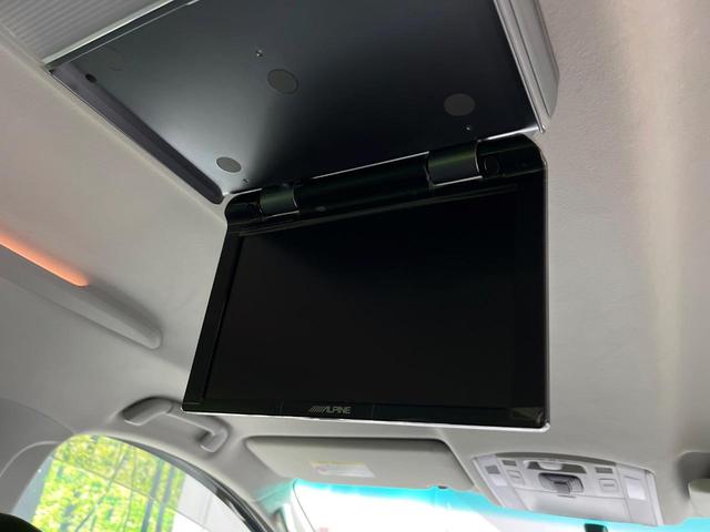 ヴェルファイア ２．４Ｚ　プラチナセレクションＩＩ　４ＷＤ　禁煙車　フリップダウンモニター　ナビ　バックカメラ　寒冷地仕様　両側パワスラ　ＥＴＣ　パワーバックドア　ＨＩＤヘッド　クリアランスソナー　純正１８インチアルミ　ウッドコンビ（3枚目）