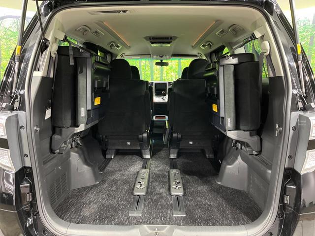 ヴェルファイア ２．４Ｚ　プラチナセレクションＩＩ　４ＷＤ　禁煙車　フリップダウンモニター　ナビ　バックカメラ　寒冷地仕様　両側パワスラ　ＥＴＣ　パワーバックドア　ＨＩＤヘッド　クリアランスソナー　純正１８インチアルミ　ウッドコンビ（12枚目）