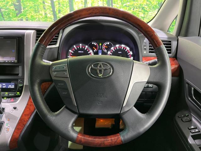 ヴェルファイア ２．４Ｚ　プラチナセレクションＩＩ　４ＷＤ　禁煙車　フリップダウンモニター　ナビ　バックカメラ　寒冷地仕様　両側パワスラ　ＥＴＣ　パワーバックドア　ＨＩＤヘッド　クリアランスソナー　純正１８インチアルミ　ウッドコンビ（13枚目）