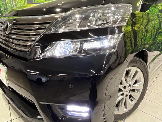 ヴェルファイア ２．４Ｚ　プラチナセレクションＩＩ　４ＷＤ　禁煙車　フリップダウンモニター　ナビ　バックカメラ　寒冷地仕様　両側パワスラ　ＥＴＣ　パワーバックドア　ＨＩＤヘッド　クリアランスソナー　純正１８インチアルミ　ウッドコンビ（14枚目）