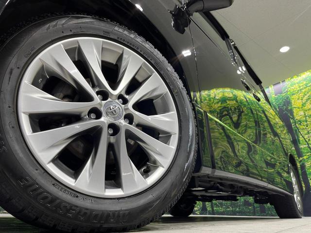 ヴェルファイア ２．４Ｚ　プラチナセレクションＩＩ　４ＷＤ　禁煙車　フリップダウンモニター　ナビ　バックカメラ　寒冷地仕様　両側パワスラ　ＥＴＣ　パワーバックドア　ＨＩＤヘッド　クリアランスソナー　純正１８インチアルミ　ウッドコンビ（15枚目）