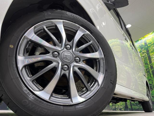 N-BOXカスタム L 4WD 禁煙車 衝突軽減 純正ナビ 両側電動ドア レーダークルーズ バックカメラ Bluetooth クリアランスソナー ETC ドラレコ 前席シートヒーター LEDヘッドライト オートライト(14枚目)