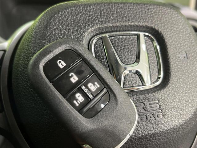 フリード ｅ：ＨＥＶクロスター　登録済未使用車　４ＷＤ　両側電動ドア　衝突軽減　アダプティブクルーズ　ブラインドスポットモニター　前席シートヒーター　クリアランスソナー　ＬＥＤヘッドライト　ＬＥＤフォグ　オートライト　オートエアコン（8枚目）