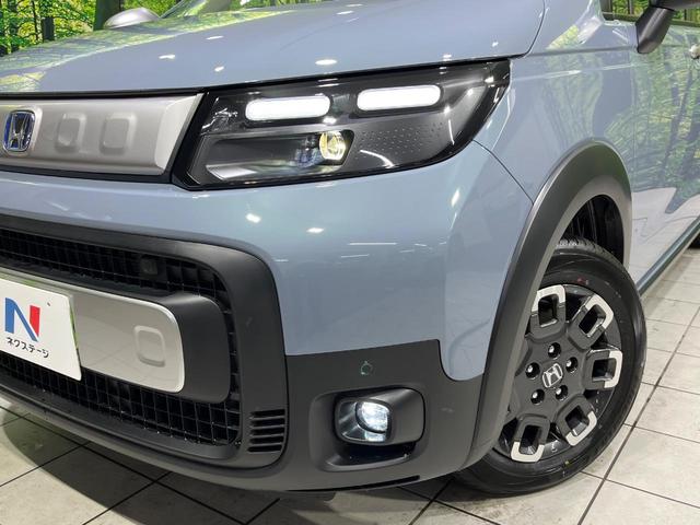 フリード ｅ：ＨＥＶクロスター　登録済未使用車　４ＷＤ　両側電動ドア　衝突軽減　アダプティブクルーズ　ブラインドスポットモニター　前席シートヒーター　クリアランスソナー　ＬＥＤヘッドライト　ＬＥＤフォグ　オートライト　オートエアコン（14枚目）