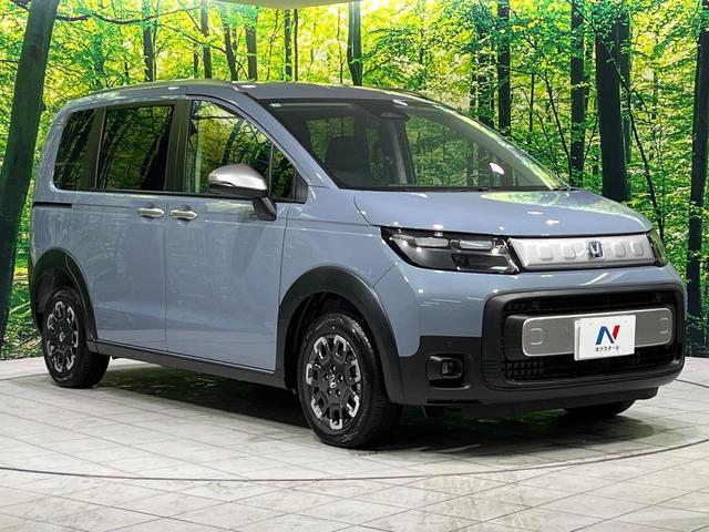 フリード ｅ：ＨＥＶクロスター　登録済未使用車　４ＷＤ　両側電動ドア　衝突軽減　アダプティブクルーズ　ブラインドスポットモニター　前席シートヒーター　クリアランスソナー　ＬＥＤヘッドライト　ＬＥＤフォグ　オートライト　オートエアコン（18枚目）