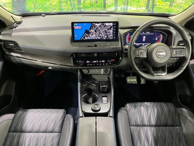 エクストレイル オーテック e-4ORCE 禁煙車 衝突軽減 プロパイロット 純正12.3型ナビ 全周囲カメラ ETC2.0 ドラレコ パワーバックドア 黒革シート 前席パワーシート 全席シートヒーター ルーフレール 純正20インチアルミ(2枚目)